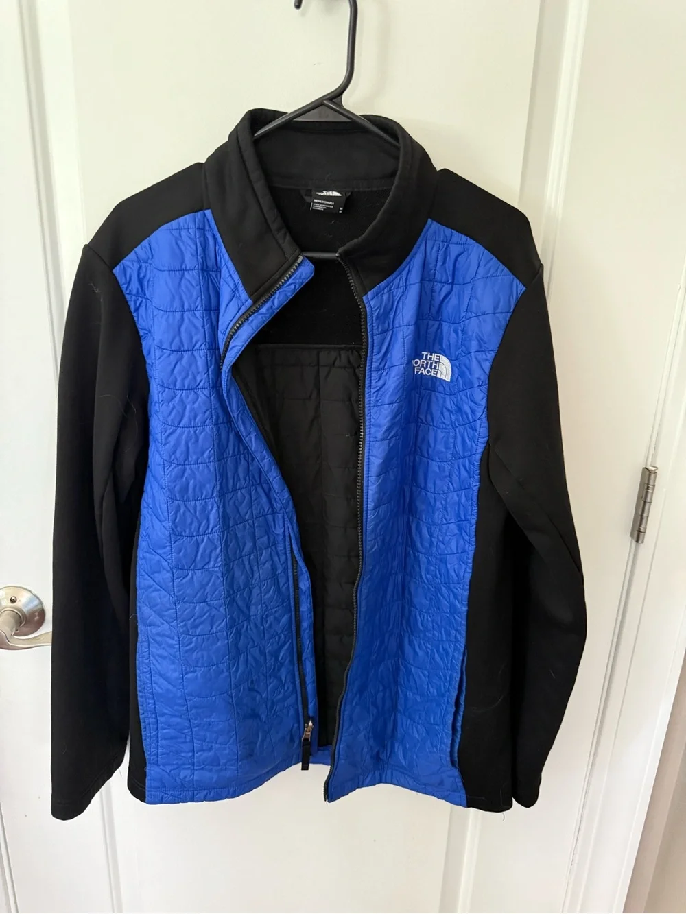 The North Face Black Jacket with Quilted Blue Panels - Men's Size Medium